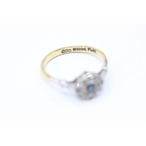 226 - 18ct gold sapphire and diamond halo ring (2.7g) Size M