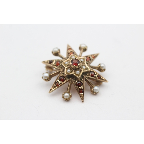 229 - 9ct gold garnet and culture pearl star brooch (4.6g)