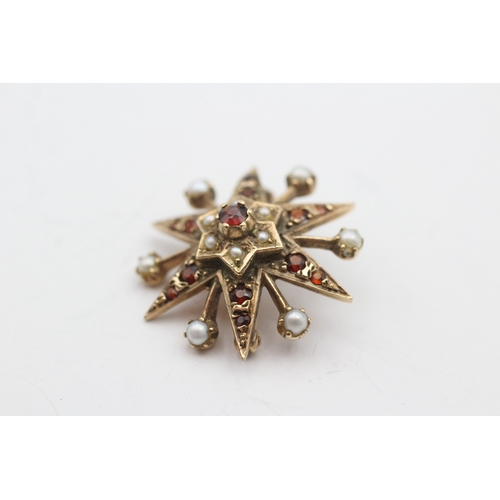 229 - 9ct gold garnet and culture pearl star brooch (4.6g)