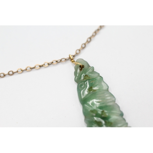 231 - 18ct gold carved jade pendant necklace with 9ct chain (3.5g)