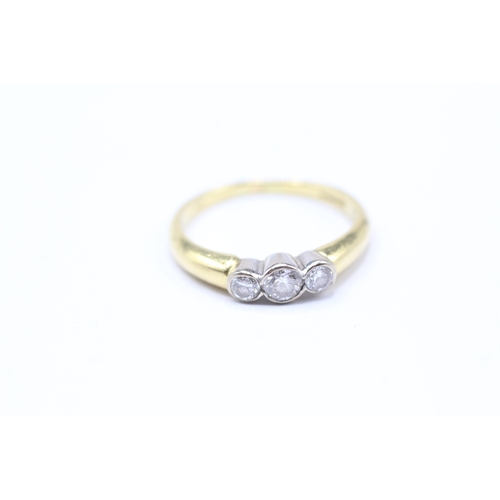 240 - 18ct gold diamond trilogy ring (3.1g) Size L