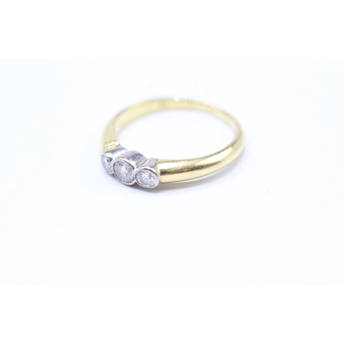 240 - 18ct gold diamond trilogy ring (3.1g) Size L