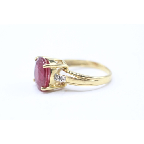 245 - 18ct gold ruby and diamond set cocktail ring (4.5g) Size K