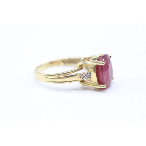 245 - 18ct gold ruby and diamond set cocktail ring (4.5g) Size K