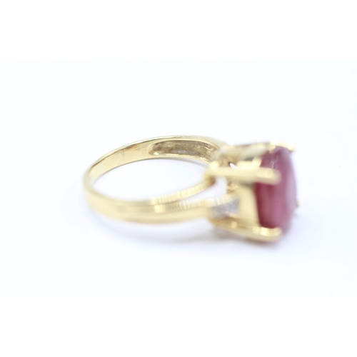 245 - 18ct gold ruby and diamond set cocktail ring (4.5g) Size K