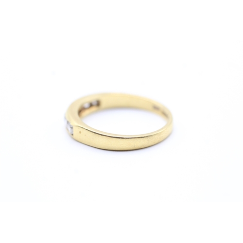 25 - 18ct gold diamond channel setting ring (3.8g) Size P