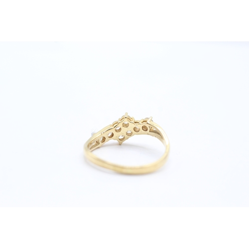 39 - 18ct gold diamond bypass ring (2.6g) Size N