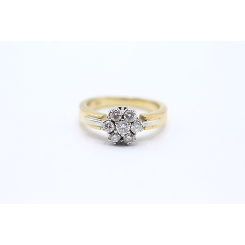 40 - 18ct gold diamond seven stone floral cluster ring (5.1g) Size K 1/2