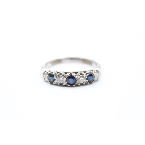 45 - 18ct white gold diamond & sapphire seven stone ring (3.9g) Size O