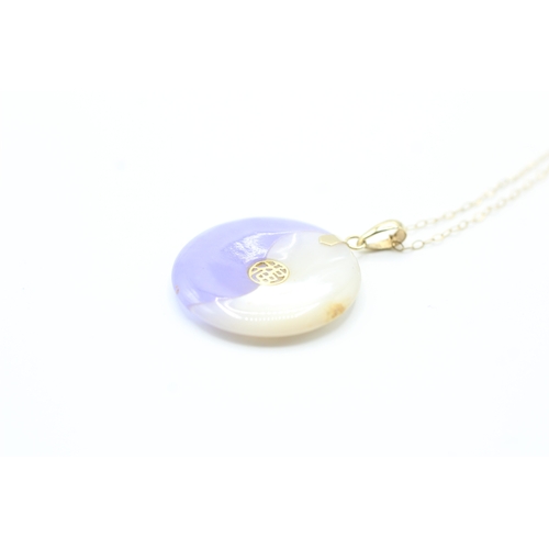 76 - 14ct gold lavender jade & mother of pearl pendant with a 9ct gold chain (4.7g)