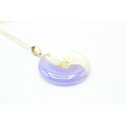 76 - 14ct gold lavender jade & mother of pearl pendant with a 9ct gold chain (4.7g)