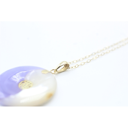 76 - 14ct gold lavender jade & mother of pearl pendant with a 9ct gold chain (4.7g)