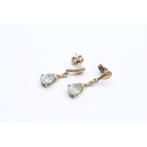 77 - 9ct gold pear cut blue gemstone drop earrings (1.6g)