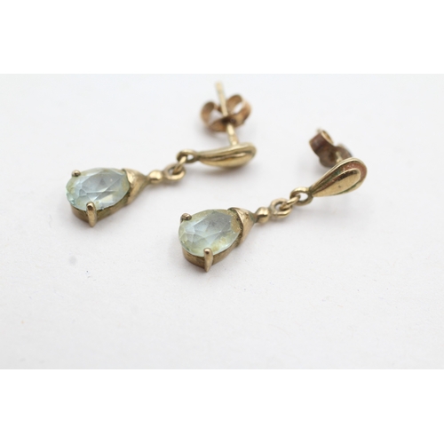 77 - 9ct gold pear cut blue gemstone drop earrings (1.6g)