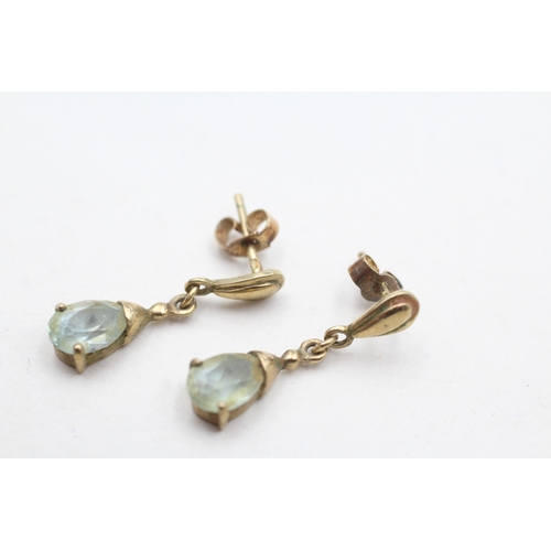 77 - 9ct gold pear cut blue gemstone drop earrings (1.6g)