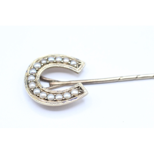 83 - 9ct gold antique seed pearl horseshoe stick pin (3.4g)