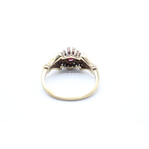 99 - 9ct gold ruby and diamond halo set ring (3.2g) Size O