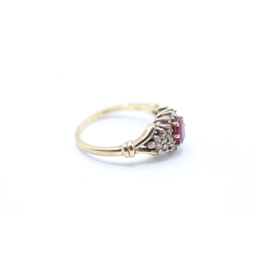 99 - 9ct gold ruby and diamond halo set ring (3.2g) Size O