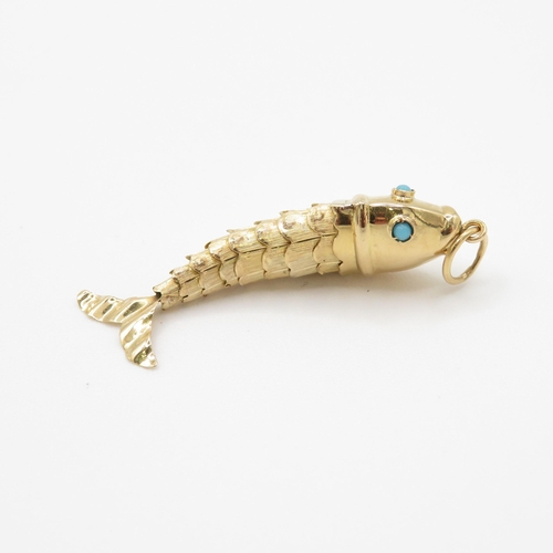 1 - 9ct Gold Articulated Fish Pendant with Turquoise Eyes - 2.4g