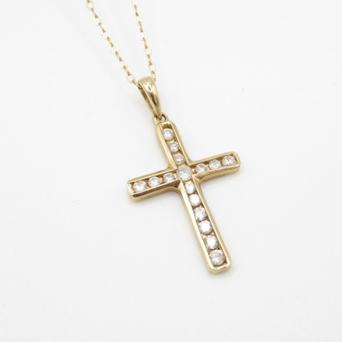 133 - 9ct gold diamond cross pendant on chain (2.2g)