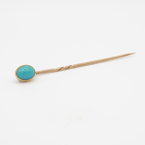 179 - 9ct gold blue gemstone stick pin (1.3g)