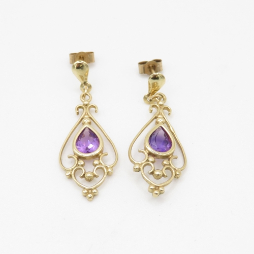 216 - 9ct gold amethyst ornate drop earrings (2.2g)