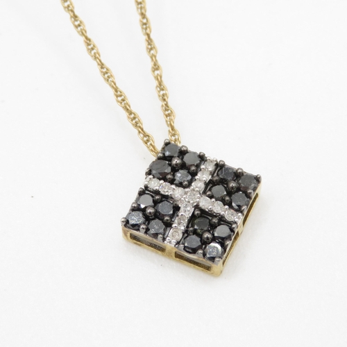 220 - 9ct gold square diamond pendant on chain (2g)