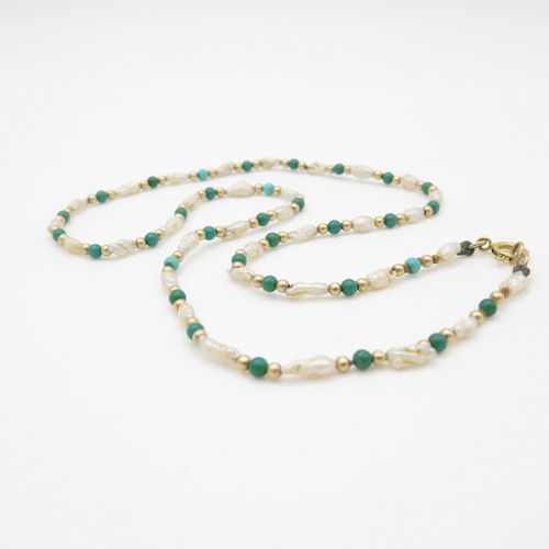 243 - 9ct gold rice pearl and blue gemstone beaded necklace (3.2g)