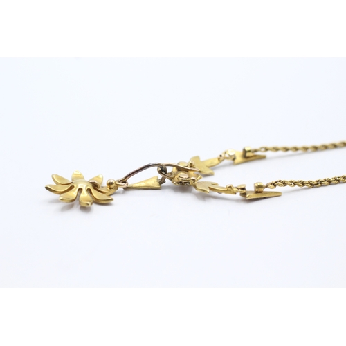 105 - 18ct gold antique seed pearl floral necklace (7.9g)