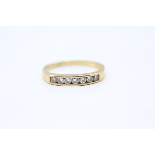 107 - 18ct gold diamond seven stone ring (2.8g) Size Q