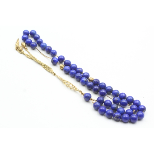 109 - 18ct gold lapis lazuli twist necklace (33.7g)