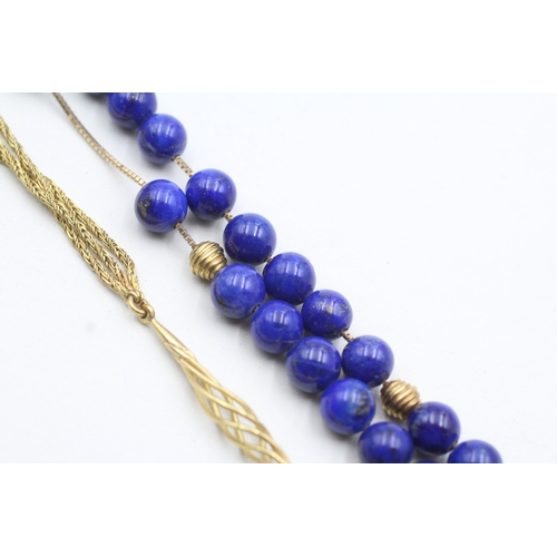 109 - 18ct gold lapis lazuli twist necklace (33.7g)