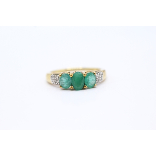 121 - 9ct gold emerald and diamond set dress ring (2.1g) Size O