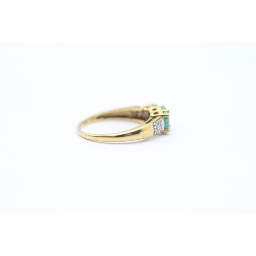 121 - 9ct gold emerald and diamond set dress ring (2.1g) Size O