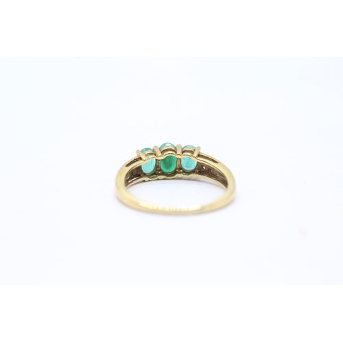 121 - 9ct gold emerald and diamond set dress ring (2.1g) Size O