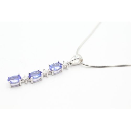 122 - 18ct gold tanzanite & diamond necklace (5.4g)