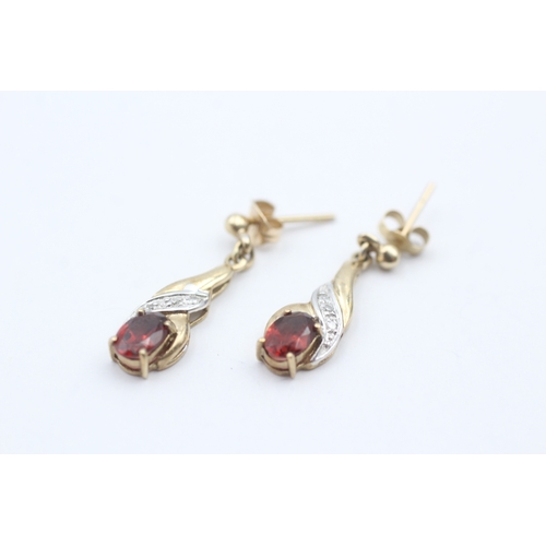 123 - 9ct gold diamond and garnet drop stud earrings (1.7g)