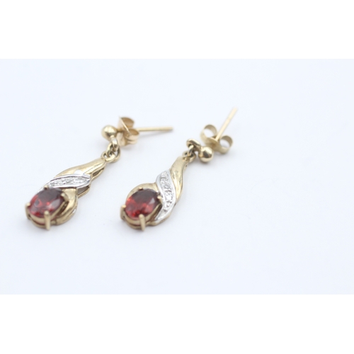 123 - 9ct gold diamond and garnet drop stud earrings (1.7g)