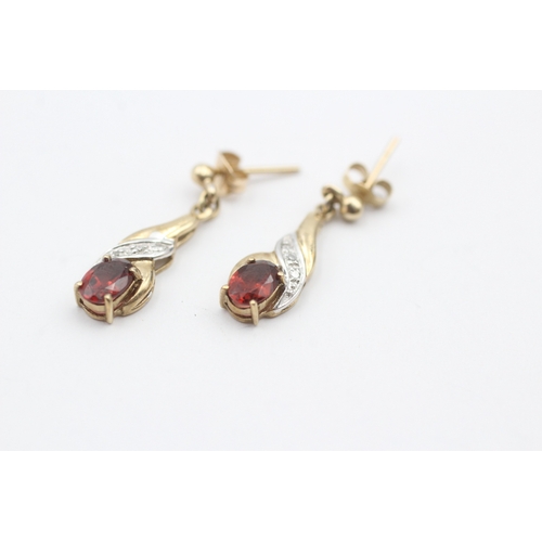 123 - 9ct gold diamond and garnet drop stud earrings (1.7g)