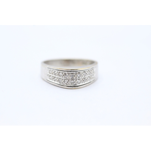 128 - 18ct white gold diamond double row ring (4.8g) Size O