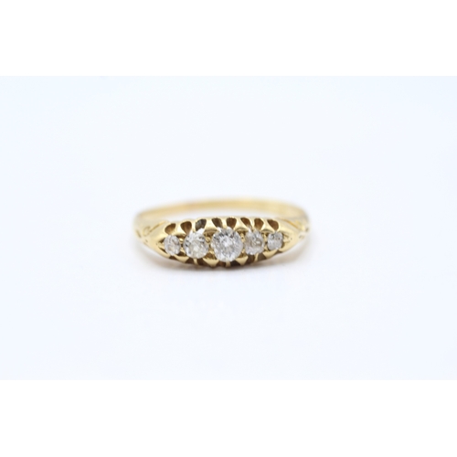 129 - 18ct gold diamond five stone ring (3.2g) Size R