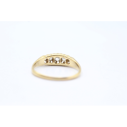 129 - 18ct gold diamond five stone ring (3.2g) Size R