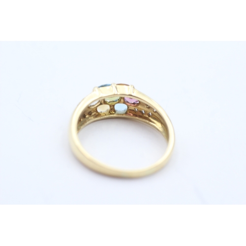 13 - 18ct gold diamond and vari hue gemstone ring (6.3g) Size V