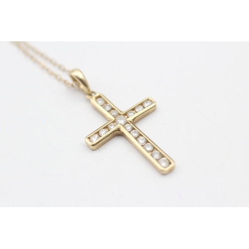 133 - 9ct gold diamond cross pendant on chain (2.2g)