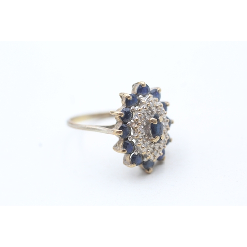 135 - 9ct gold blue gemstone and diamond cluster set ring (3.1g) Size N