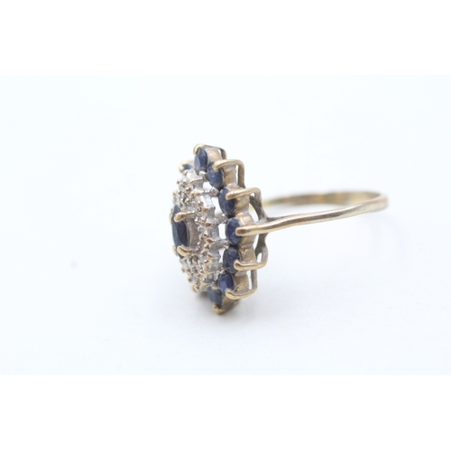 135 - 9ct gold blue gemstone and diamond cluster set ring (3.1g) Size N