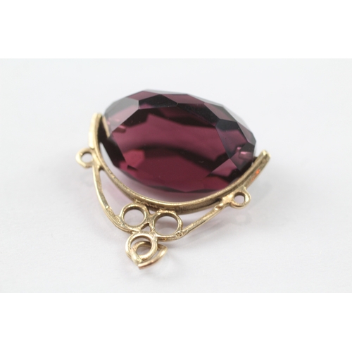 14 - 9ct gold vintage faceted red gemstone spinning fob