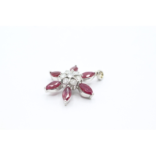 145 - 18ct white gold diamond and ruby flower pendant (4.4g)