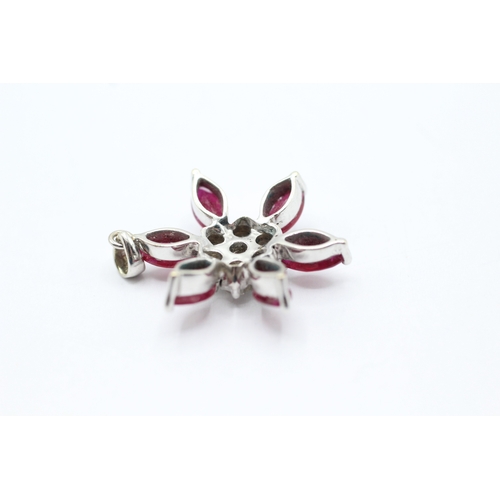 145 - 18ct white gold diamond and ruby flower pendant (4.4g)