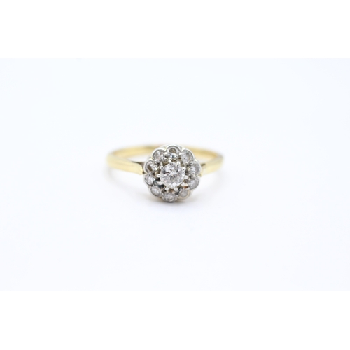 148 - 18ct gold diamond halo ring (3.6g) Size P 1/2